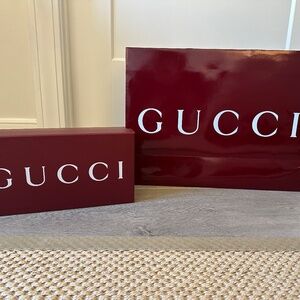 Gucci shoe box and shopping bag